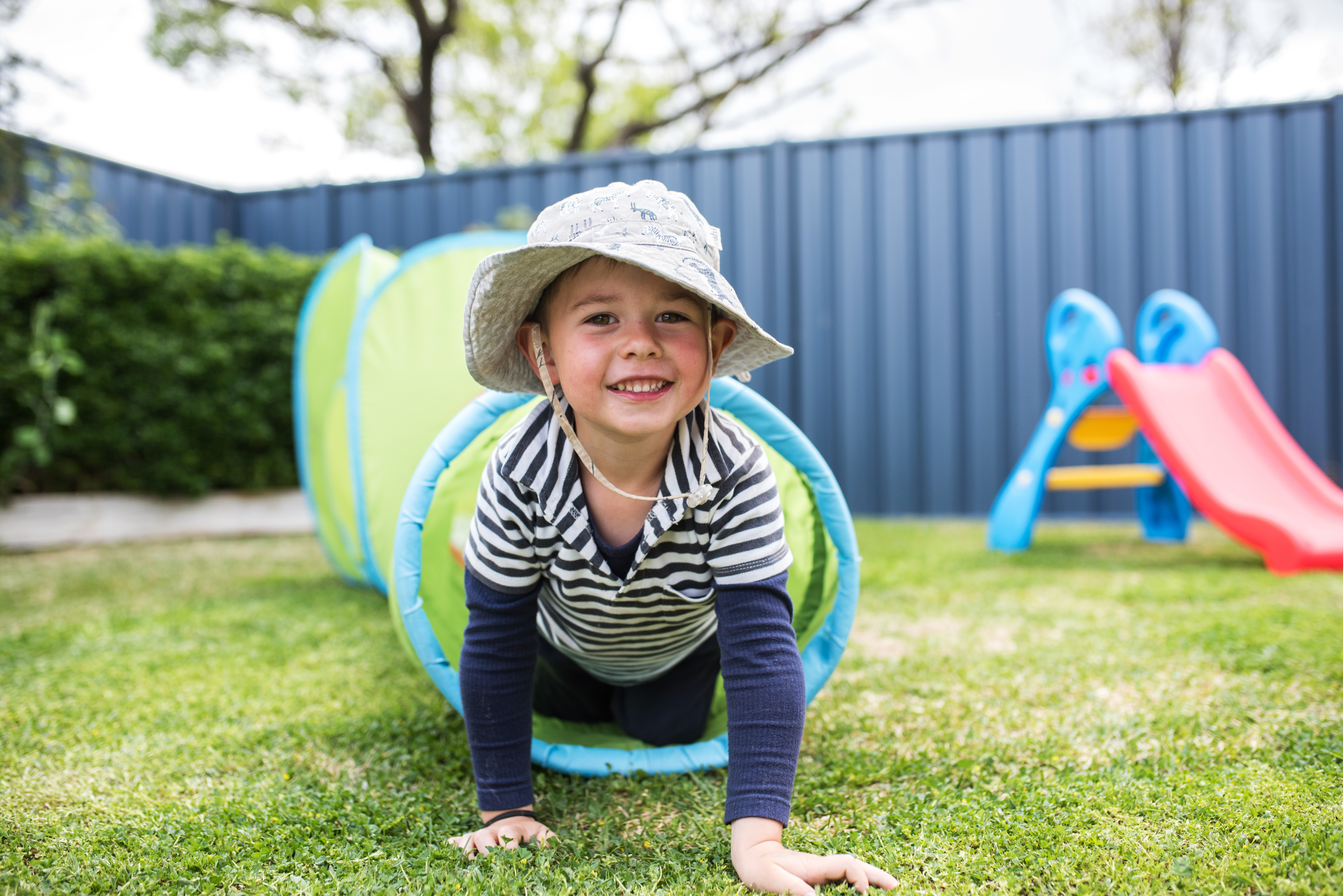 Adults and children together at a family day care play session