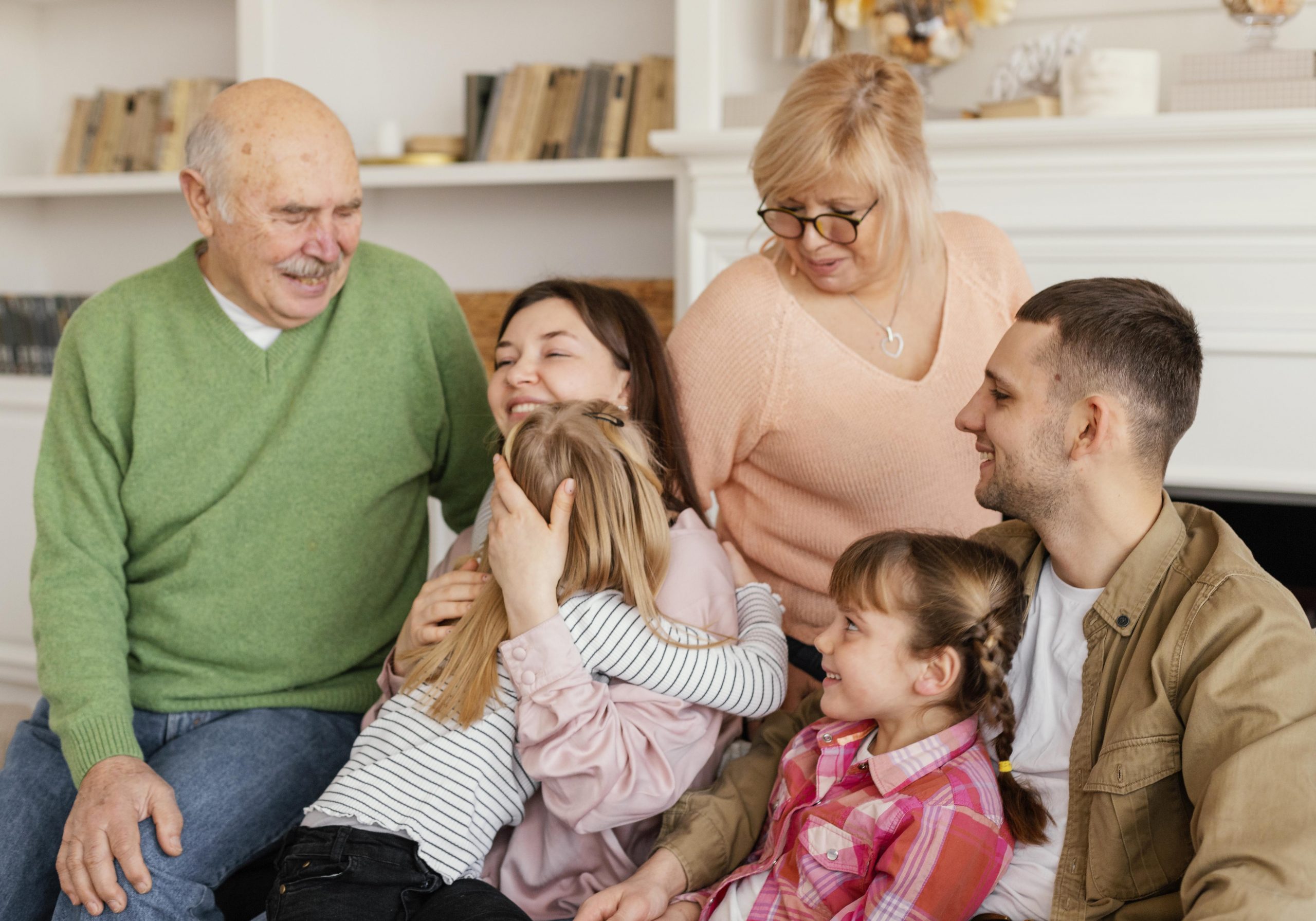 medium-shot-happy-family-couch